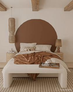 painted headboard terracotta arch in a warm bedroom